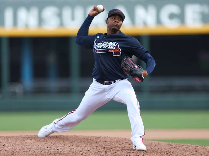 Feb 27, 2023; North Port, Florida, USA; Atlanta Braves relief pitcher Raisel Iglesias (26) throws a pitch against the Toronto Blue Jays in the fifth inning during spring training at CoolToday Park.